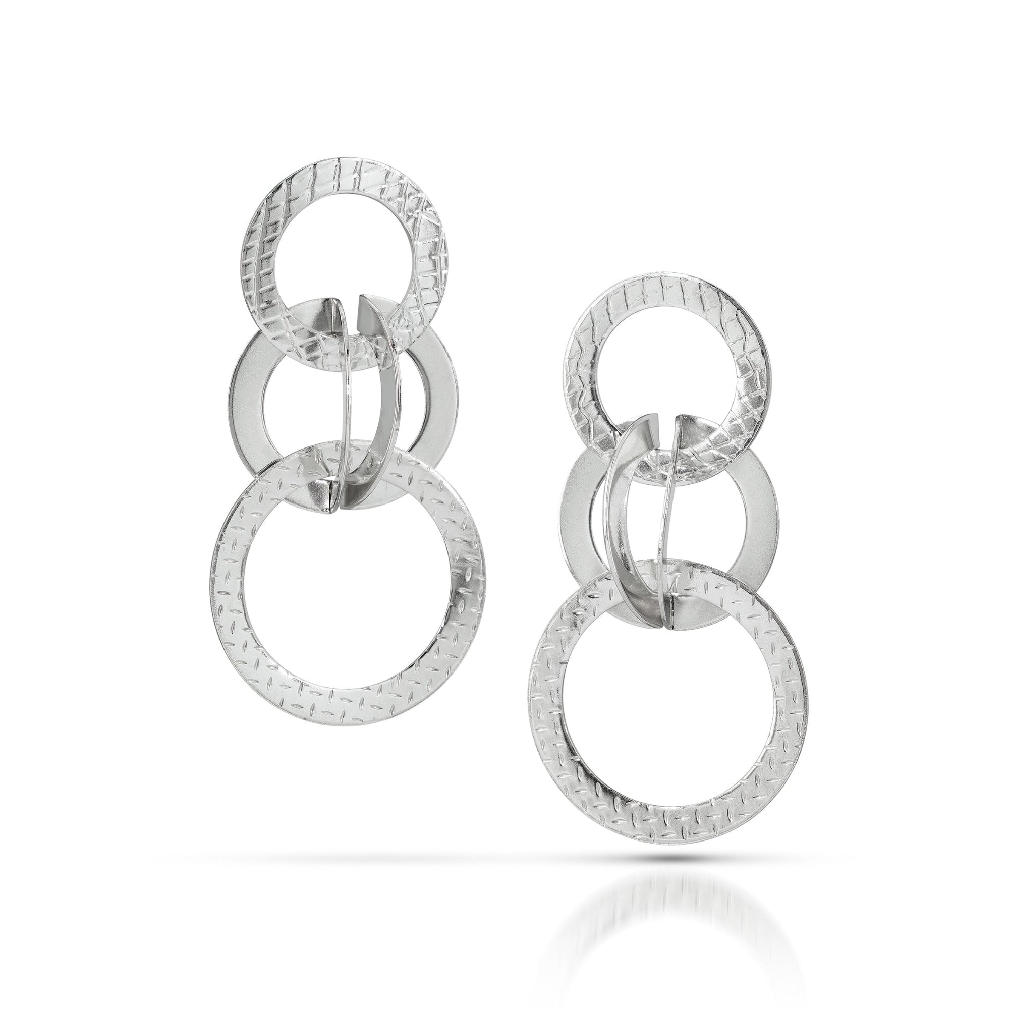 Silver circular earrings on a white background-kelli jewelry