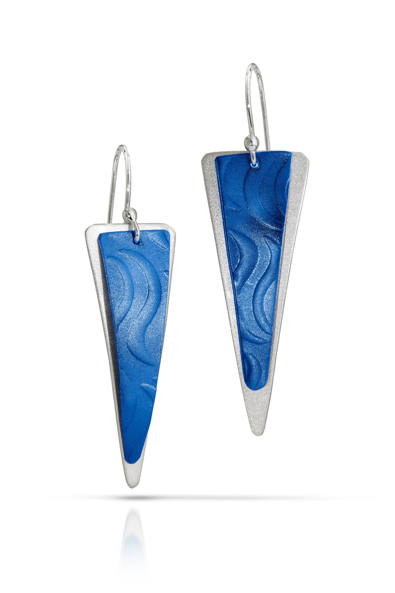 Pair of blue marbled triangle earrings with silver accents on a white background