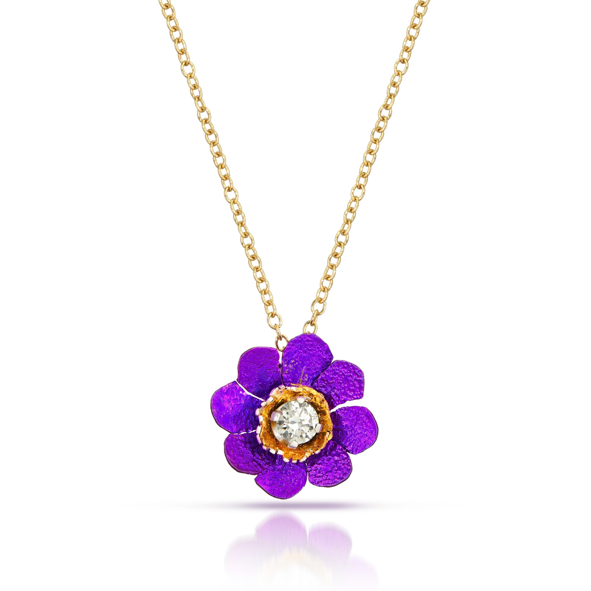 Purple flower-shaped pendant with a gold chain on a white background