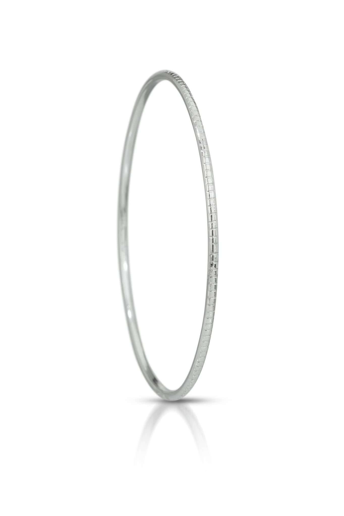 Silver bangle on a white background
