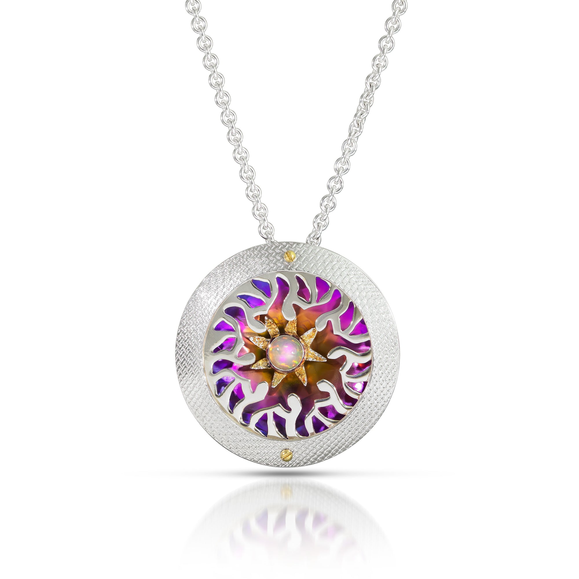 Silver necklace with a colorful circular pendant on a white background